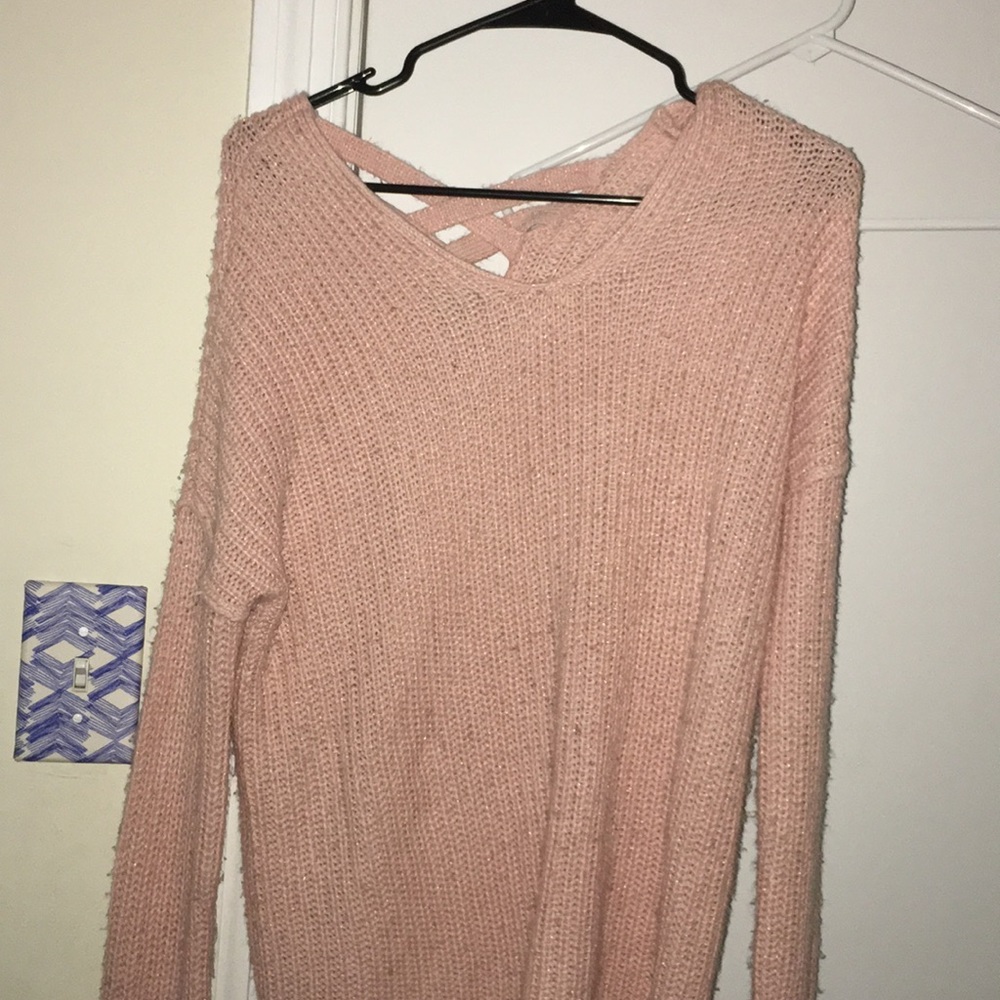 A pink sweater